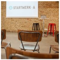 Präsentation mit Kinobestuhlung im StartWerk-A Eventspace